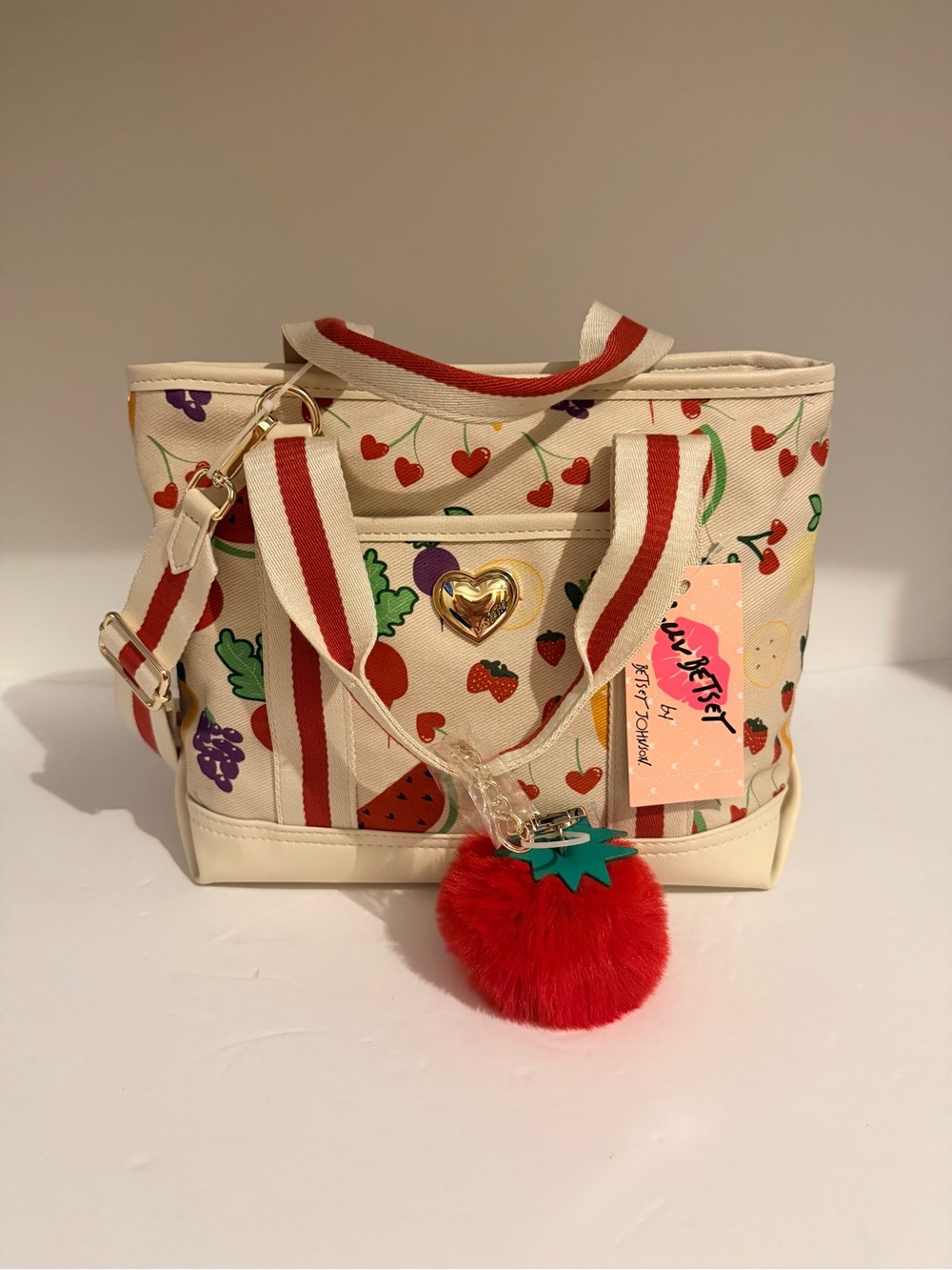 Cream Fruit-Print Tote Bag with Red Pom Charm